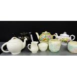 A mixed lot to include various Staffordshire teapots, milk jugs and sugar bowls, (a lot)