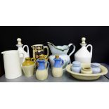 A mixed lot of stone wares to include a Buchanan Thistle patterned jug, miscellaneous stoneware jugs