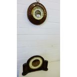 An Art Deco mantle clock and an oak framed barometer, (2)