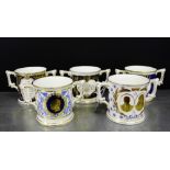 A collection of five Royal Crown Derby bone china limited edition commemorative loving cups to