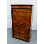 A walnut Wellington chest, fitted seven graduating drawers, on plinth base, 134 x 78cm