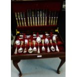 A table canteen containing a suite of Epns Queen's pattern flatware, 49 x 53cm