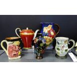 A mixed lot to include a Royal Doulton floral patterned jug, a Glyn Colledge for Denby tankard, a