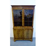 George III mahogany bookcase, the pediment top over a pair of Gothic arched astragal glazed doors