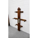 An oak hat and coat rack, 122 x 75cm