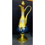 A blue and gilt glass decanter and stopper, 40cm high