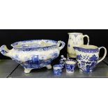 A mixed lot of Staffordshire blue and white potteries to include a twin handled planter, a jug, an