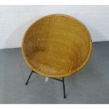 A Mid Century basket chair on black hairpin supports, 70 x 72cm