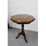 An inlaid occasional table on tripod supports, 62 x 55cm