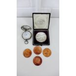 A London silver cased pocket watch together with a Victorian white metal agricultural medal and with
