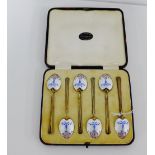 A cased set of six Birmingham silver and guilloche enamel spoons