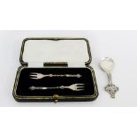George VI 'Celtic' silver caddy spoon, Chester 1945 together with a cased pair of Birmingham