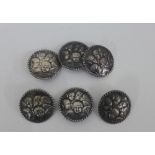 A set of six Birmingham silver 'Reynolds Cherub' buttons (6)