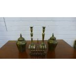 A pair of brass candlesticks, Indian style brass jar and covers and a large Epns toastrack (5)