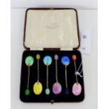 A cased set of six Birmingham silver and enamel harlequin coffee bean handled spoons by Walker and