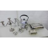 A quantity of Epns wares to include a spirit kettle on stand, entree dish and cover, candelabrum,