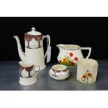 Art Deco tea wares to include Crown Ducal orange tree patterned coffee pot, cream jug and sugar