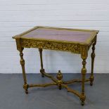 A Continental giltwood table vitrine, the rectangular glass lift up top over a carved