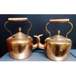 Two copper kettles, largest 23cm high