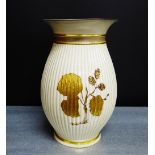 A Royal Copenhagen baluster vase with gilded leaf and foliage pattern, 21cm high