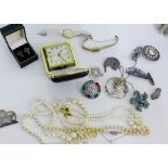 A mixed lot to include faux pearls, marcasite brooches, enamel brooch, two wristwatches, bangle,