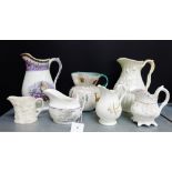 A mixed lot of 19th century and later jugs to include a bat print milk jug, a Scottish Pottery