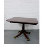 A mahogany Pembroke table, fitted one drawer and one dummy drawer, on a turned balustrade support