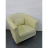 A cream vinyl tub chair, 76 x 82cm