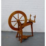 An Ashford pine spinning wheel, 85cm high