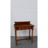 A light oak ledgeback hall table, the rectangular top over a single drawer on barley twist supports,