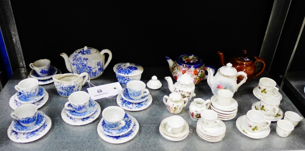 Miniature porcelain tea sets to include and blue and white chrysanthemum pattern set and others