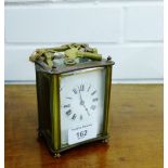 An early 20th century brass cased carriage clock, the top inscribed 'Won by Barney 30th June 1928 at