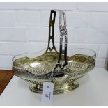 A mid 19th century German silver basket with glass insert with pierced sides and classical Greek key