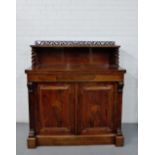 A 19th century Scottish - Thomas Colqhoun, rosewood chiffonier, the ledgeback with a carved frieze