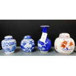 A Chinese blue and white prunus pattern bottle neck vase, together with a ginger jar and cover, a
