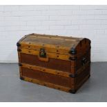 A domed top storage trunk with handles to side, 56 x 76cm
