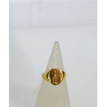 An 18ct gold signet ring