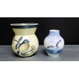 A Royal Copenhagen vase painted with a bird perched on a branch, together with a smaller blue and