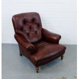 A leather button back armchair, 96 x 85cm