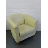 A cream vinyl tub chair, 76 x 82cm