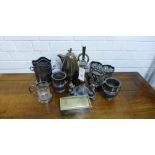 A collection of Epns wares to include a triple bottle stand, a pair of vases, a coffee pot and a