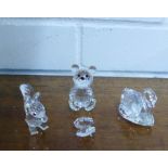 A collection of four Swarovski crystals, boxed, to include Squirrel, a Teddy Bear, an Oyster Shell