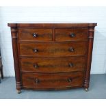 A 19th century mahogany bow front chest with a rectangular top and two short and three long