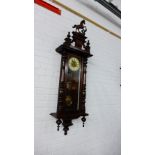 A mahogany cased Vienna wall clock, 160 x 50cm