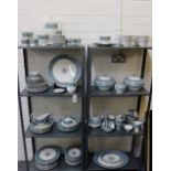 An extensive Wedgwood 'Florentine' patterned dinner service comprising coffee pot, fourteen coffee