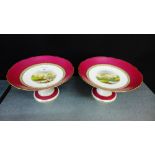 A pair of porcelain hand painted comports (2)