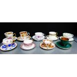 A collection of porcelain cabinet cups and saucers to include Meissen and Rosenthal etc., (9)