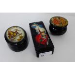 A collection of three Russian lacquer boxes to include a Fedoskino oval box painted with a boy and