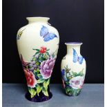 An Old Tupton ware baluster vase, tubeline decorated with flowers and butterfly pattern, together