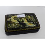 A Russian lacquer box, the lid signed and titled and painted with swans, 15 x 10 cm